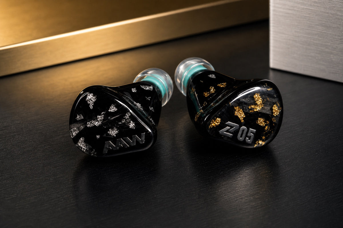 Z05 AuAg shells in a minimalist luxury studio setting