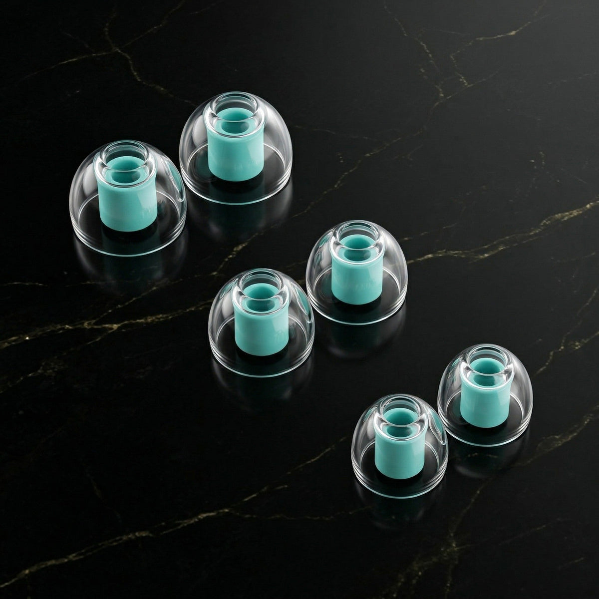 LiquidMorph clear eartips with teal inner bore