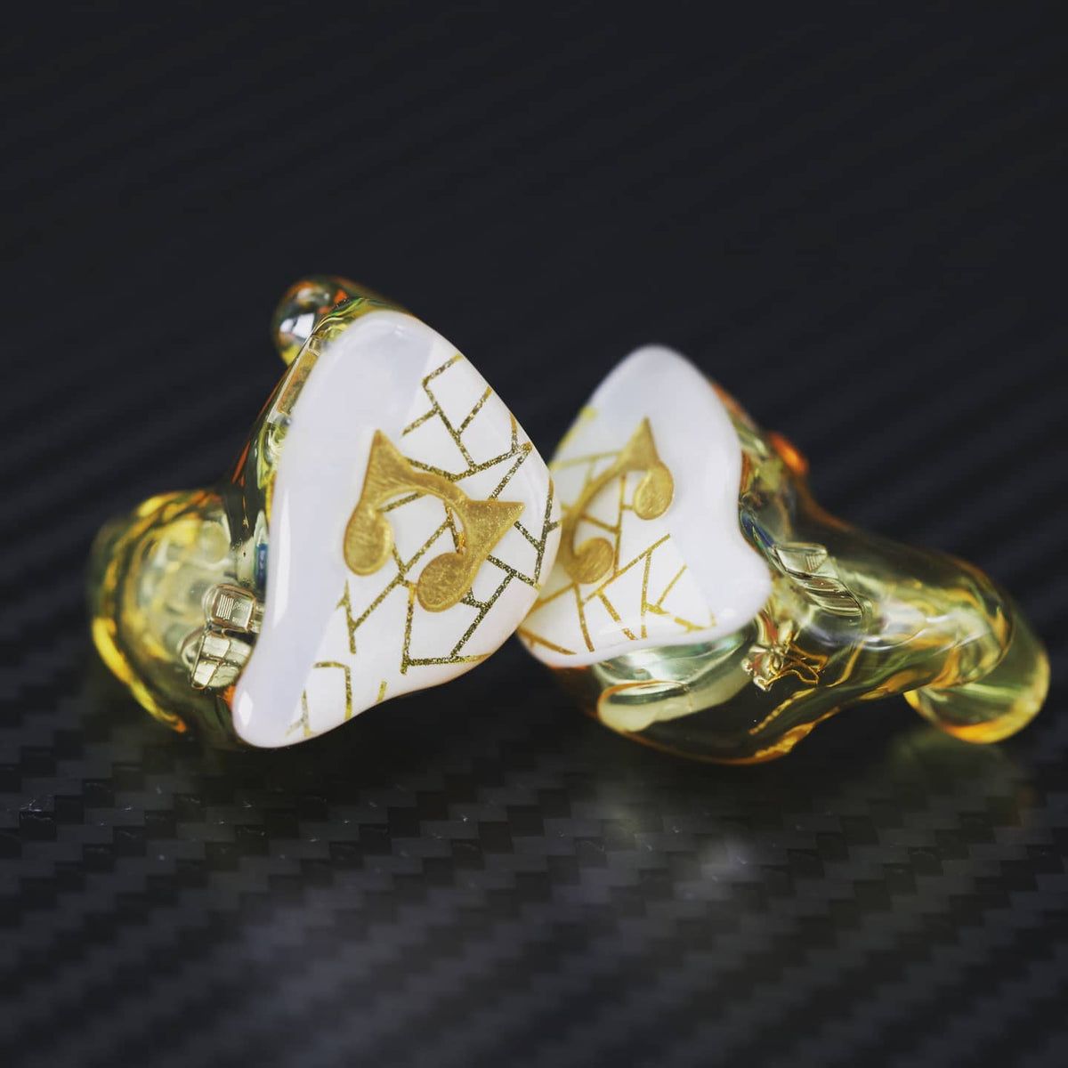 AAW custom IEM with white and gold faceplate finish