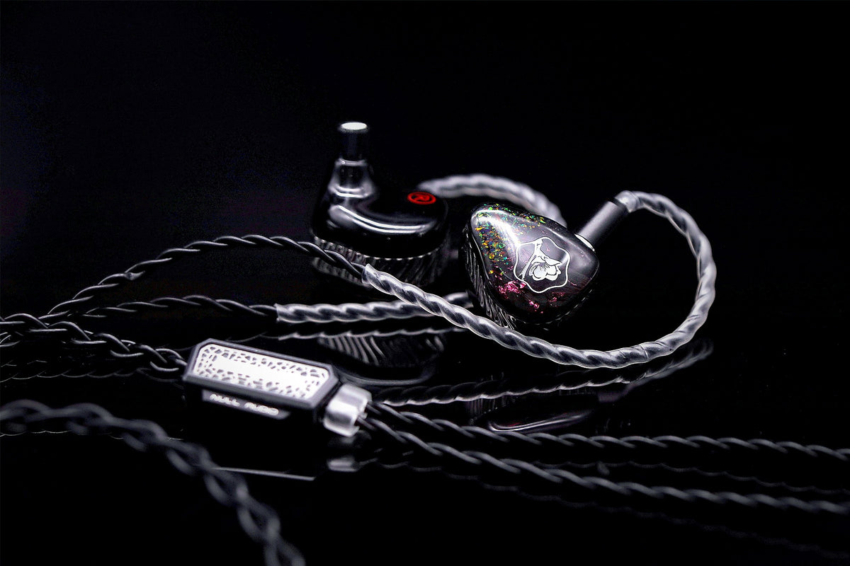 Black Malus side profile showing stainless steel mid-case and opal faceplate