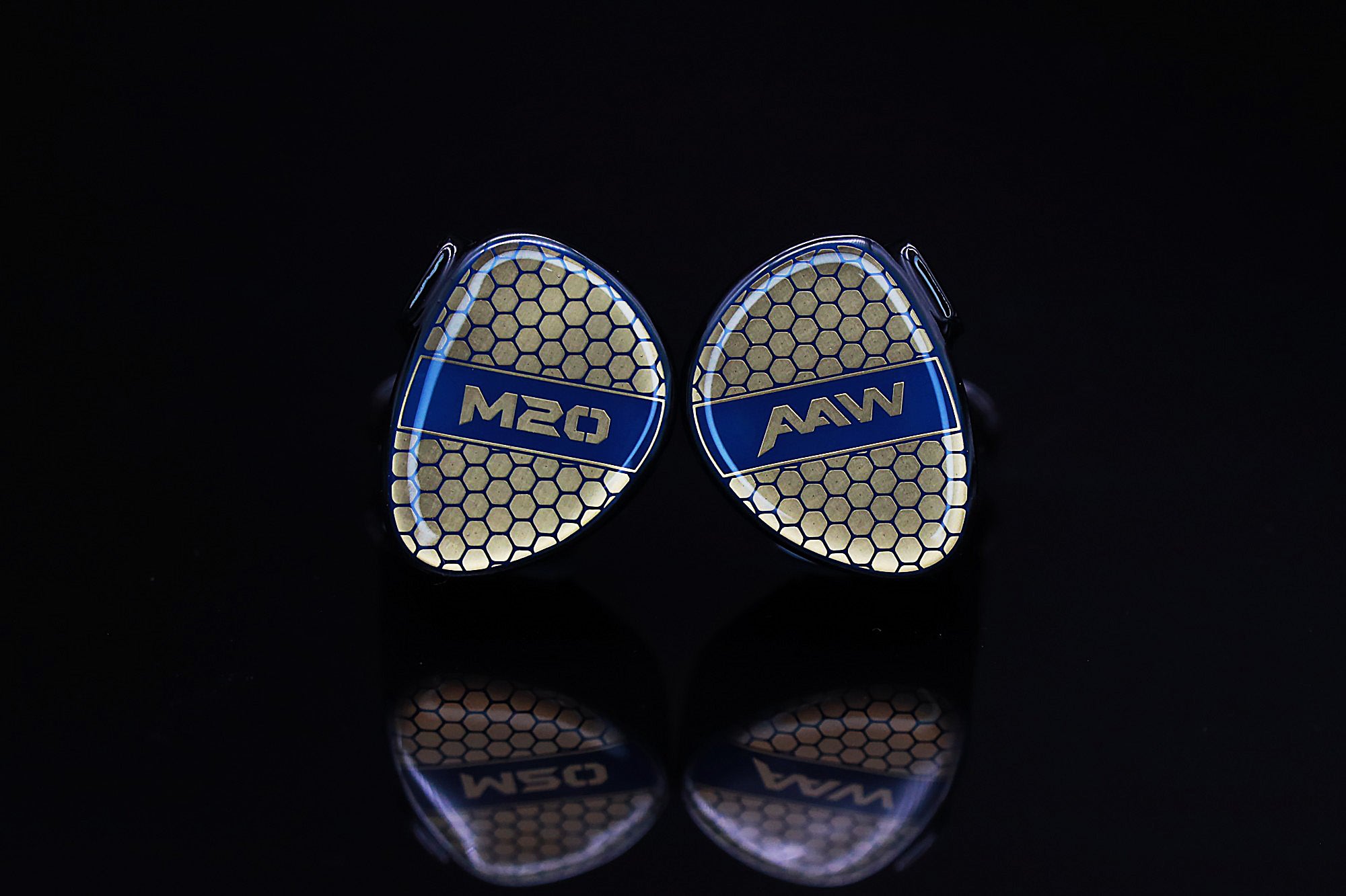 AAW M20 monitor with faceplate and shell on black reflective surface