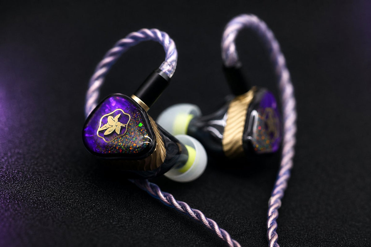 Close-up of Mokara monitors with purple cable and opal faceplate details