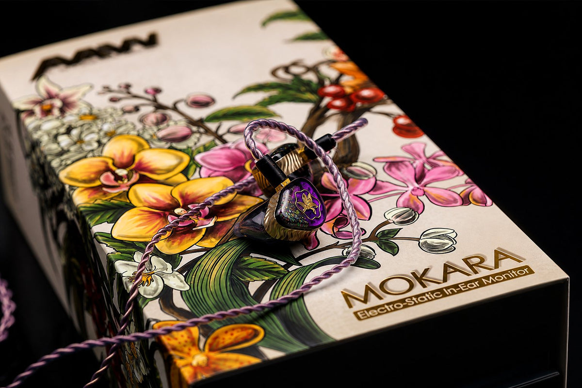 Mokara monitor and cable placed on floral Mokara packaging artwork