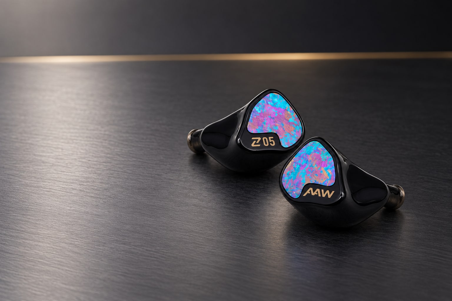 AAW Z05 in-ear monitors on brushed graphite