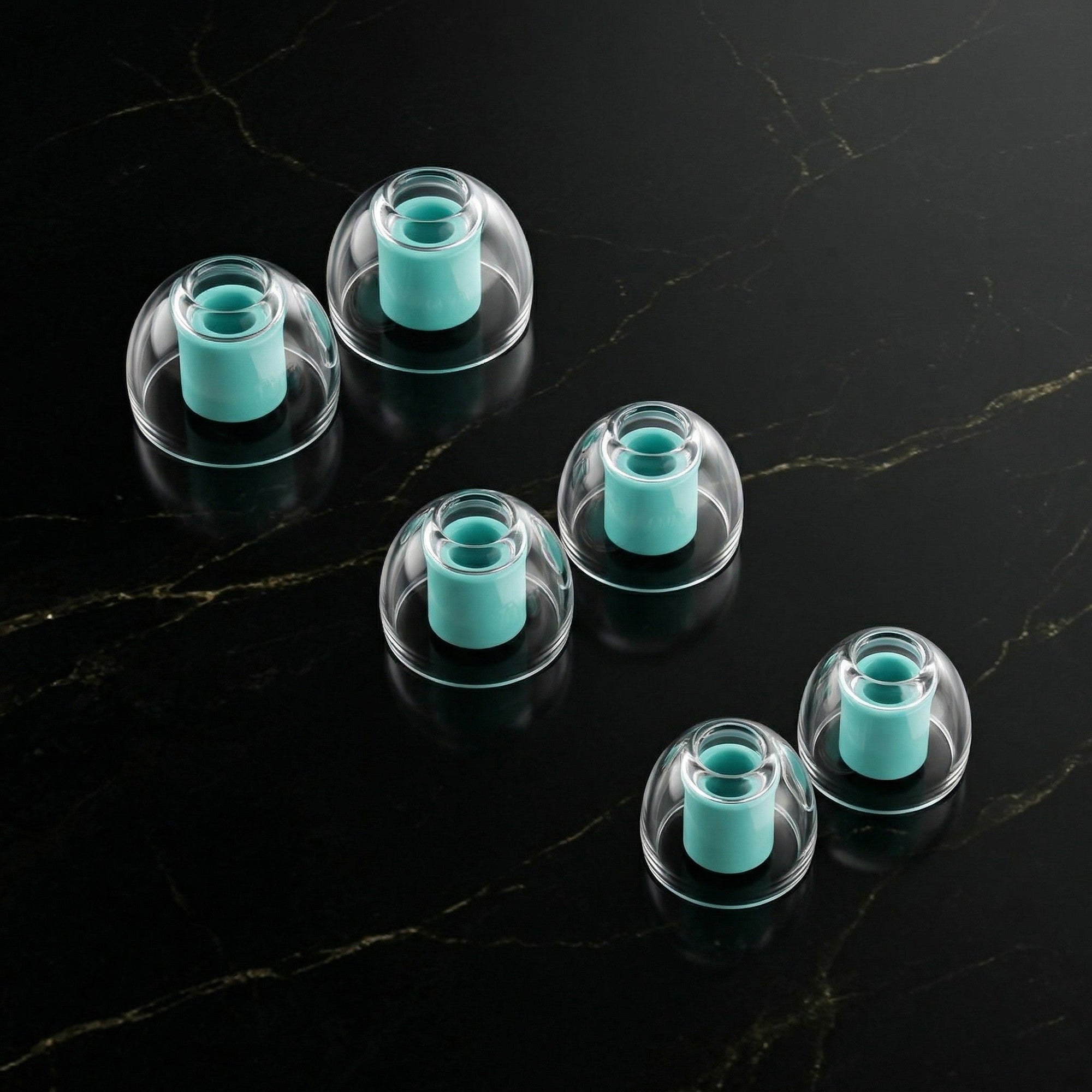 LiquidMorph clear ear tips with teal inner bore